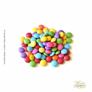 Κουφετάκια Crispo με σοκολάτα γάλακτος και λεπτή επίστρωση ζάχαρης σε σχήμα κυκλικό μίνι και σε διάφορα χρώματα.